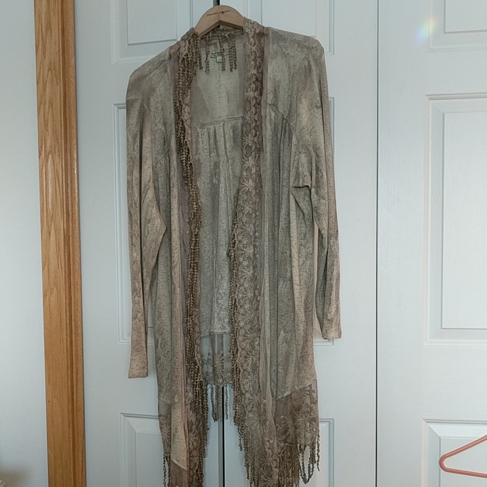 Ladies embellished, distressed LS sweater.